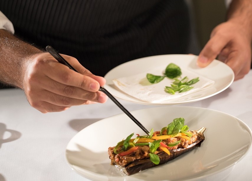 Chefs plating food